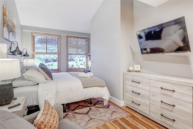 140 Ida Belle Dr Unit 8294, Dillon, CO 80435 - bedroom featuring wood finished floors and baseboards