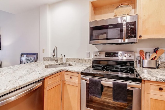 140 Ida Belle Dr Unit 8294, Dillon, CO 80435 - kitchen featuring stainless steel appliances, light brown cabinetry, and light stone counters