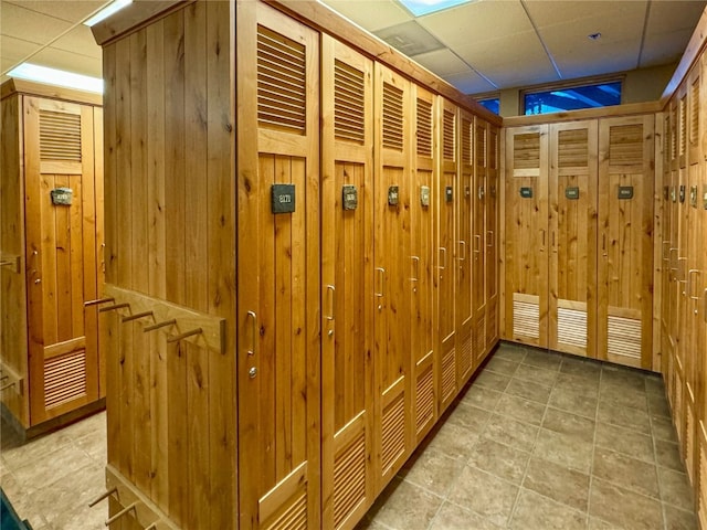 140 Ida Belle Dr Unit 8294, Dillon, CO 80435 - hallway featuring a drop ceiling and wood walls