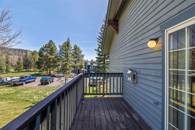 deck featuring a yard