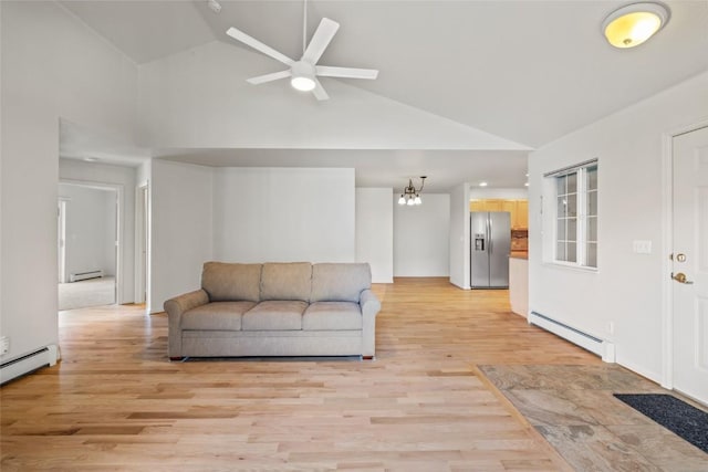 living area with light wood finished floors, ceiling fan with notable chandelier, high vaulted ceiling, and baseboard heating