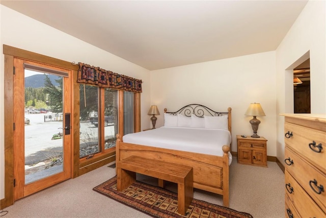 1207 W Keystone Rd Unit 2703, Keystone, CO 80435 - bedroom featuring access to exterior and light carpet