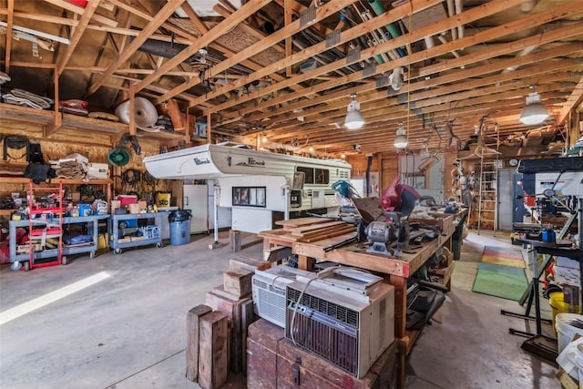 76 County Road 60b, Maybell, CO 81640 - garage featuring a workshop area