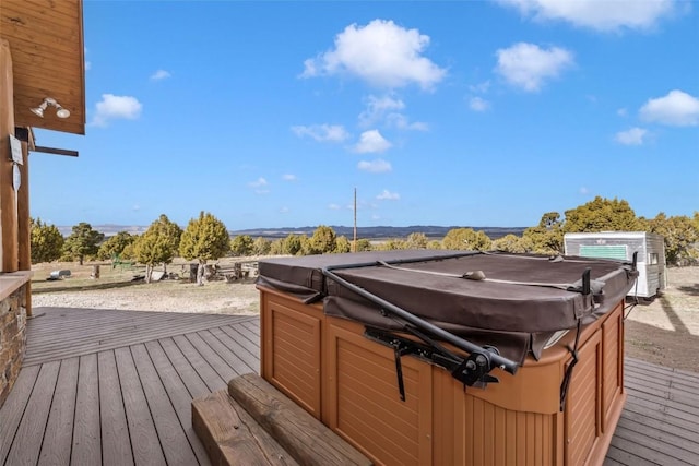 76 County Road 60b, Maybell, CO 81640 - wooden deck featuring a hot tub