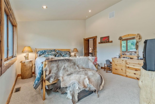 76 County Road 60b, Maybell, CO 81640 - bedroom with light carpet, baseboards, recessed lighting, and lofted ceiling