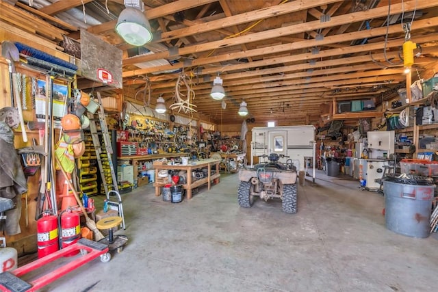 76 County Road 60b, Maybell, CO 81640 - garage featuring a workshop area