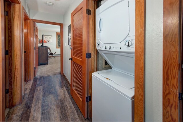 21620 US Highway 6 Unit 2152, Keystone, CO 80435 - laundry room with stacked washer / drying machine and dark wood-style flooring