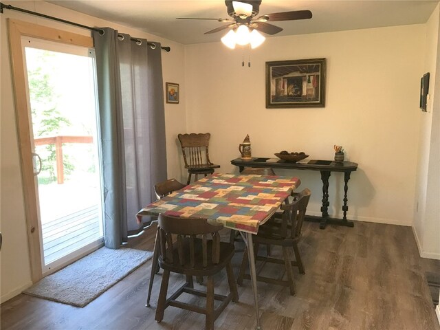 337 E 3rd St, Oak Creek, CO 80467 - dining space with wood finished floors, a ceiling fan, and baseboards
