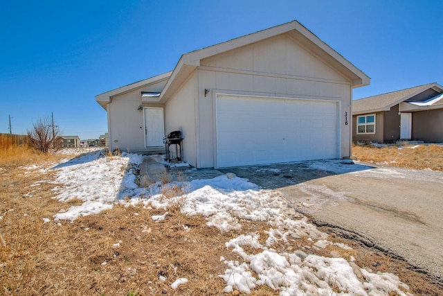 316 Stone Creek Dr, Fairplay, CO 80440 - exterior space featuring dirt driveway and an attached garage