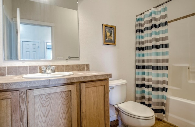 316 Stone Creek Dr, Fairplay, CO 80440 - bathroom featuring shower / bath combination with curtain, toilet, and vanity