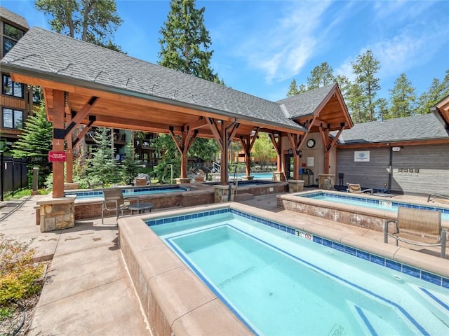 720 Columbine Rd Unit 303, Breckenridge, CO 80424 - community pool featuring a hot tub and a gazebo