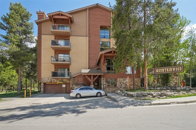 720 Columbine Rd Unit 303, Breckenridge, CO 80424 - view of property featuring a garage