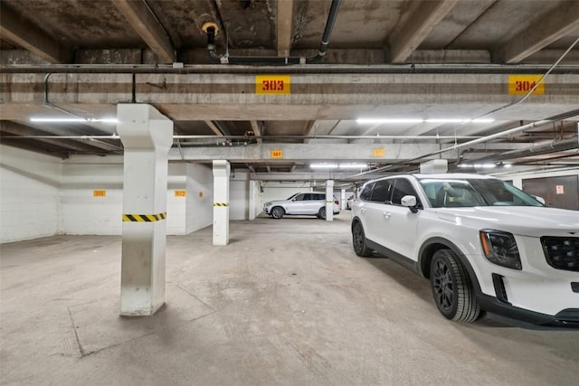720 Columbine Rd Unit 303, Breckenridge, CO 80424 - parking garage featuring a garage door opener