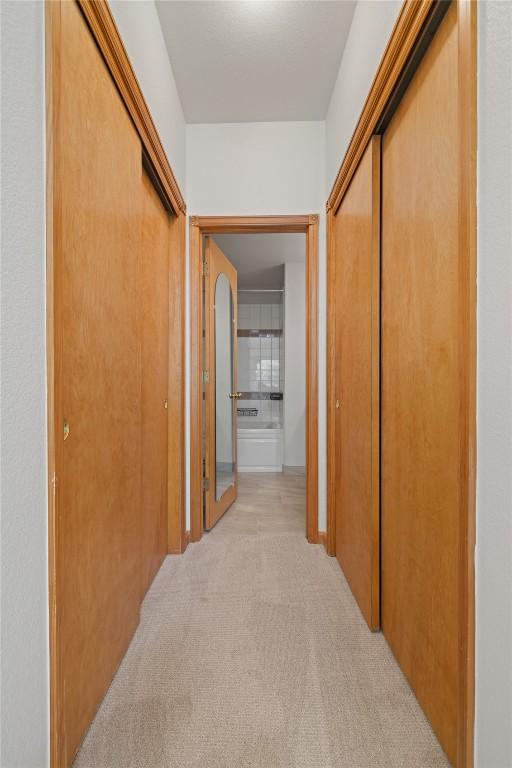 97 Lookout Ridge Dr Unit 97, Dillon, CO 80435 - hallway with light colored carpet