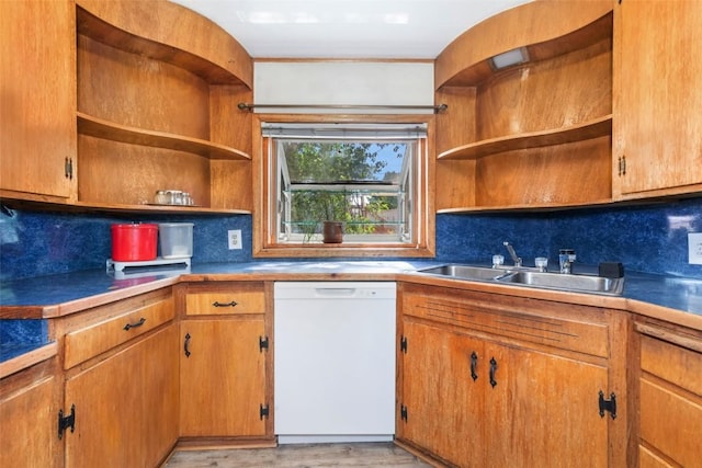 186 E Jefferson Ave, Hayden, CO 81639 - kitchen featuring open shelves, white dishwasher, tasteful backsplash, and brown cabinetry