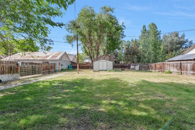 186 E Jefferson Ave, Hayden, CO 81639 - fenced backyard featuring a storage unit
