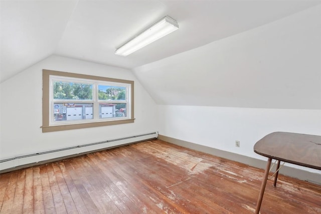 186 E Jefferson Ave, Hayden, CO 81639 - additional living space with baseboard heating, lofted ceiling, and hardwood / wood-style floors
