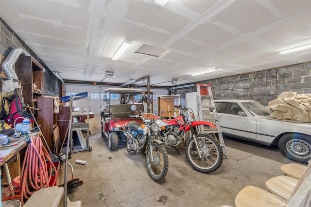 186 E Jefferson Ave, Hayden, CO 81639 - garage featuring concrete block wall