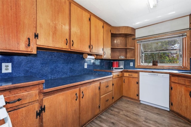 186 E Jefferson Ave, Hayden, CO 81639 - kitchen with white dishwasher, backsplash, wood finished floors, open shelves, and brown cabinets