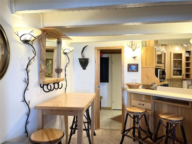1920 Ski Time Square Dr Unit 208, Steamboat Springs, CO 80487 - dining area with light tile patterned floors