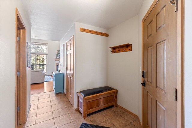 700 Lakepoint Dr Unit A10, Frisco, CO 80443 - entrance foyer featuring baseboards and light tile patterned flooring