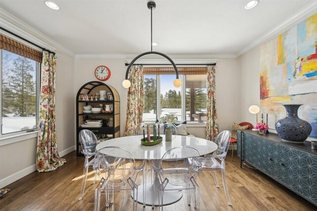 223 County Road 1041, Frisco, CO 80443 - dining area with crown molding, baseboards, and plenty of natural light
