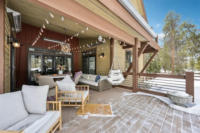 view of patio featuring an outdoor living space and a wooden deck