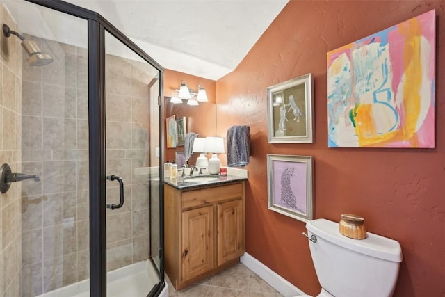 full bathroom featuring tile patterned flooring, vanity, toilet, a shower stall, and lofted ceiling