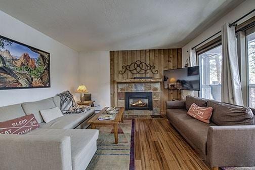 820 Columbine Rd Unit 10, Breckenridge, CO 80424 - living area featuring a fireplace and wood finished floors