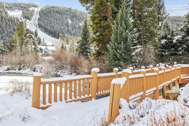 22974 US Highway 6 Unit A102, Keystone, CO 80435 - snowy yard with a mountain view