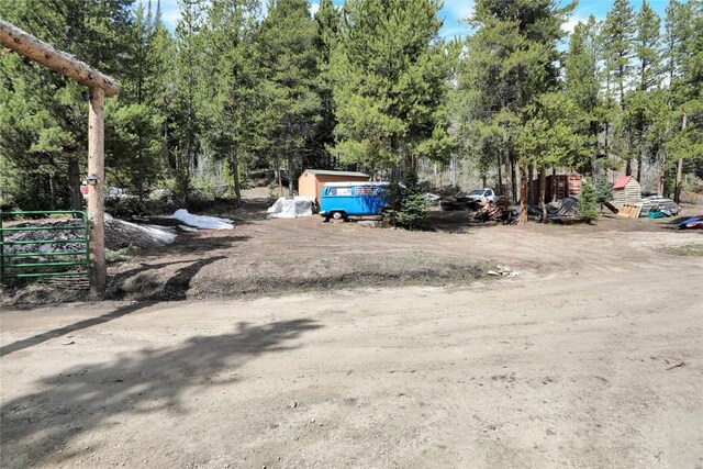 823 Gcr 8411, Tabernash, CO 80478 - view of yard with view of wooded area