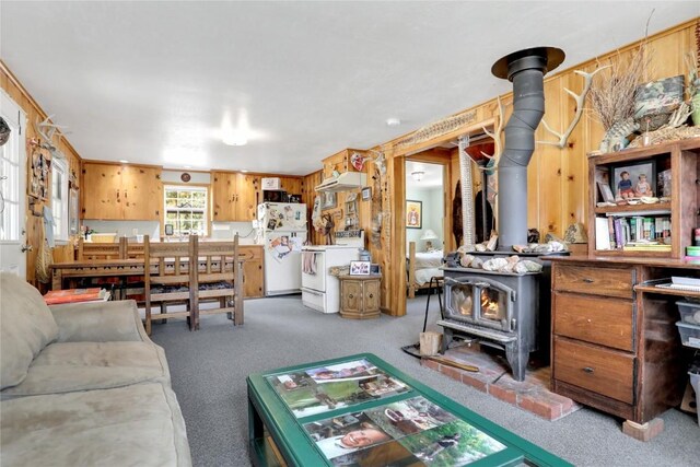 823 Gcr 8411, Tabernash, CO 80478 - carpeted living area with a wood stove