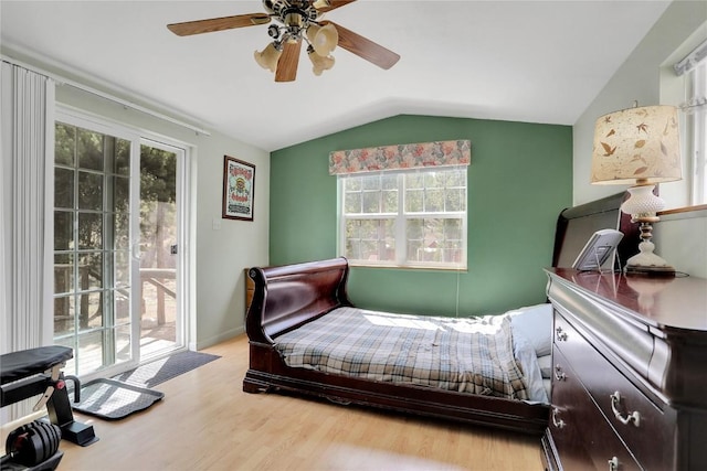 823 Gcr 8411, Tabernash, CO 80478 - bedroom featuring vaulted ceiling, access to outside, wood finished floors, a ceiling fan, and baseboards