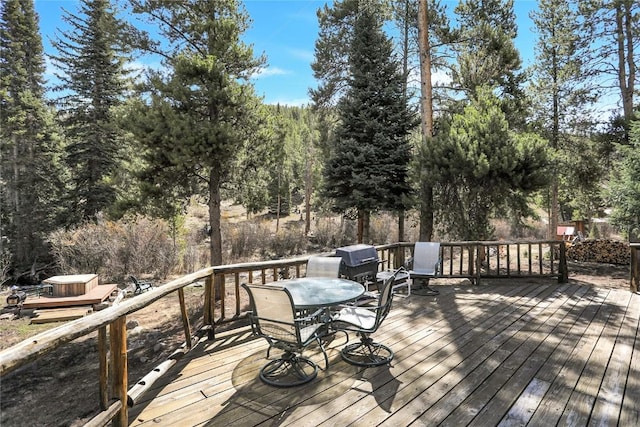 823 Gcr 8411, Tabernash, CO 80478 - wooden terrace with outdoor dining space and grilling area