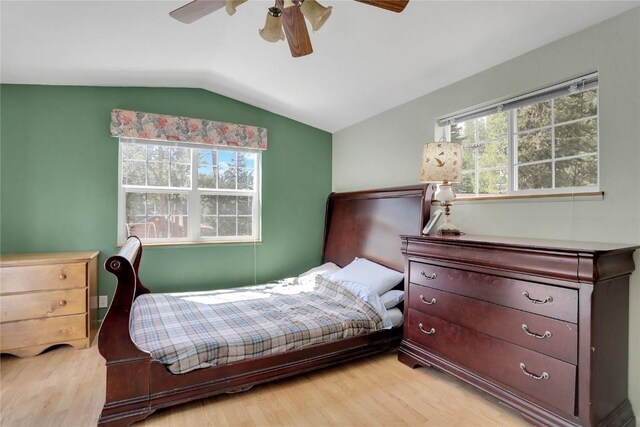 823 Gcr 8411, Tabernash, CO 80478 - bedroom featuring light wood finished floors, multiple windows, lofted ceiling, and a ceiling fan