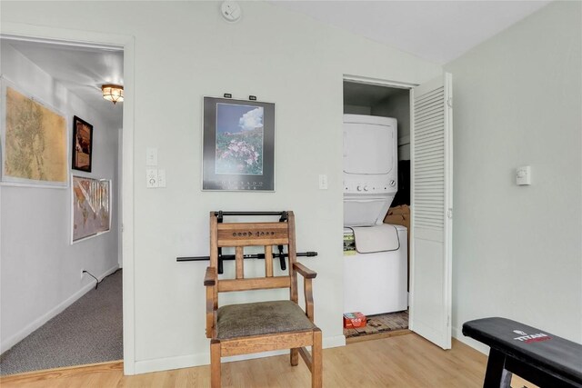 823 Gcr 8411, Tabernash, CO 80478 - interior space with estacked washer and dryer, light wood-style flooring, and baseboards