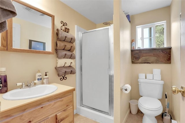 823 Gcr 8411, Tabernash, CO 80478 - bathroom featuring vanity, a stall shower, toilet, and tile patterned floors