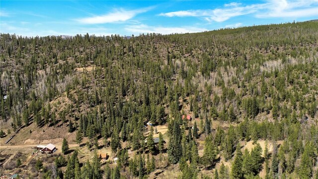 823 Gcr 8411, Tabernash, CO 80478 - aerial overview of property's location with a forest