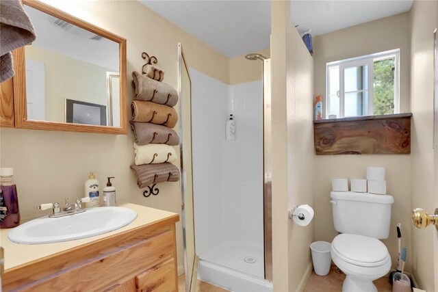 823 Gcr 8411, Tabernash, CO 80478 - bathroom featuring a shower stall, toilet, and vanity