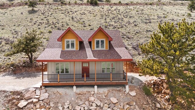 3415 Redhill Rd, Fairplay, CO 80440 - view of front of property with roof with shingles, covered porch, and board and batten siding