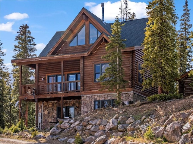 333 Camron Ln, Breckenridge, CO 80424 - back of property with stone siding, log siding, and roof with shingles