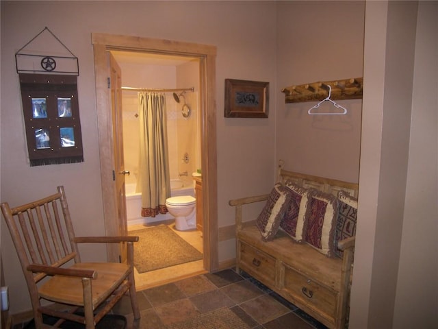 91 River Run Rd Unit 8122, Keystone, CO 80435 - bathroom featuring toilet, shower / tub combo, and baseboards