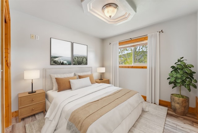 80 Cove Blvd Unit 103, Dillon, CO 80435 - bedroom featuring light wood-type flooring and baseboards