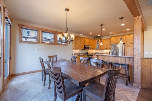 2206 Hamilton Creek Rd, Silverthorne, CO 80498 - dining space with a chandelier, recessed lighting, and light tile patterned floors