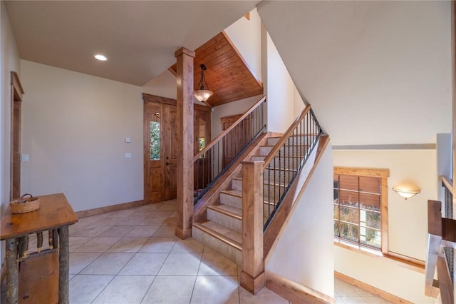 2206 Hamilton Creek Rd, Silverthorne, CO 80498 - staircase featuring tile patterned floors and recessed lighting