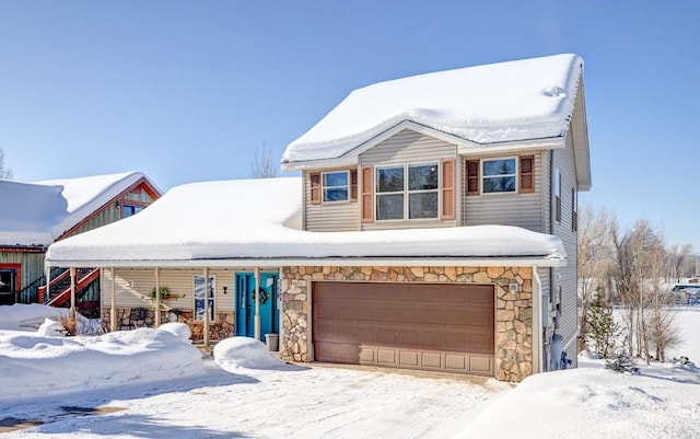 view of front of property with a garage