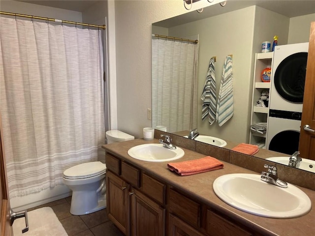951 Lakepoint Dr Unit C5, Frisco, CO 80443 - full bathroom featuring stacked washer and clothes dryer, double vanity, curtained shower, and tile patterned floors