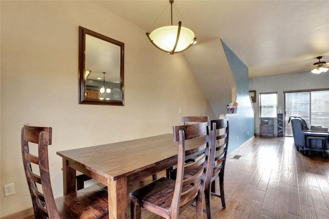 2345 Abbey Ct SW Unit 3, Steamboat Springs, CO 80487 - dining room featuring wood finished floors, visible vents, a ceiling fan, and baseboards