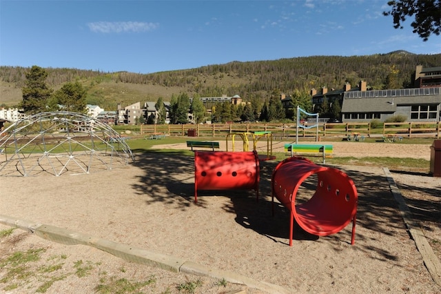 22138 US Highway 6 Unit 1560, Keystone, CO 80435 - view of playground with a dog friendly area and a forest view