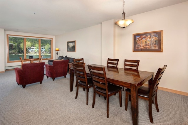 22138 US Highway 6 Unit 1560, Keystone, CO 80435 - dining room featuring light colored carpet and baseboards